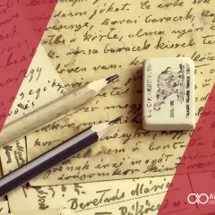 Lápices y goma de borrar sobre cartas antiguas, evocando la **structure** de un **article b2**.